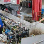 MMDA personnel clearing accumulated garbage at the Paco Pumping Station in Manila on Aug. 18, Tuesday.