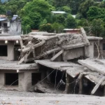 Collapsed buildings are seen in a town hit by the flash floods along the Trishuli River, amid increasing deaths and missing people, in Devighat, Nuwakot, Nepal, on August 29, 2026
