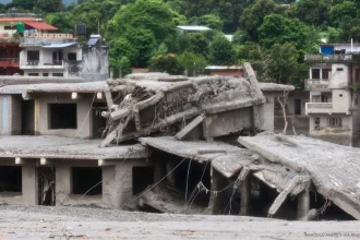 Collapsed buildings are seen in a town hit by the flash floods along the Trishuli River, amid increasing deaths and missing people, in Devighat, Nuwakot, Nepal, on August 29, 2026