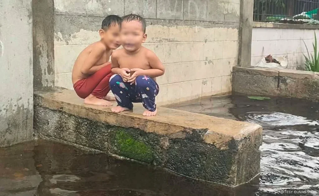 Photos of recurring deep floodwaters in a subdivision in Pampanga, taken by resident Jhune Santamaria on August 12.