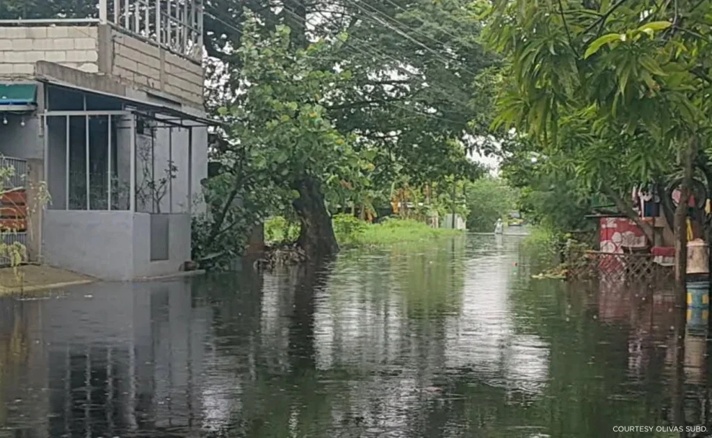 Photos of recurring deep floodwaters in a subdivision in Pampanga, taken by resident Jhune Santamaria on August 12.