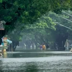 Heavy flooding submerged streets in Sta. Ana, Pampanga, forcing residents to wade through deep flood-waters on Aug. 31, Monday.