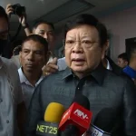 Sen. Rodante Marcoleta faces the media after appearing before the Sandiganbayan, which issued an arrest warrant against him in connection with a ₱75-million plunder case.