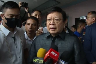 Sen. Rodante Marcoleta faces the media after appearing before the Sandiganbayan, which issued an arrest warrant against him in connection with a ₱75-million plunder case.