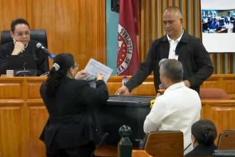 Self-confessed bagman Rodante Orbillo takes the witness stand as prosecutors present a black durabox allegedly used to transport kickbacks during the Oct. 15 bail hearing of former House Speaker Martin Romualdez.